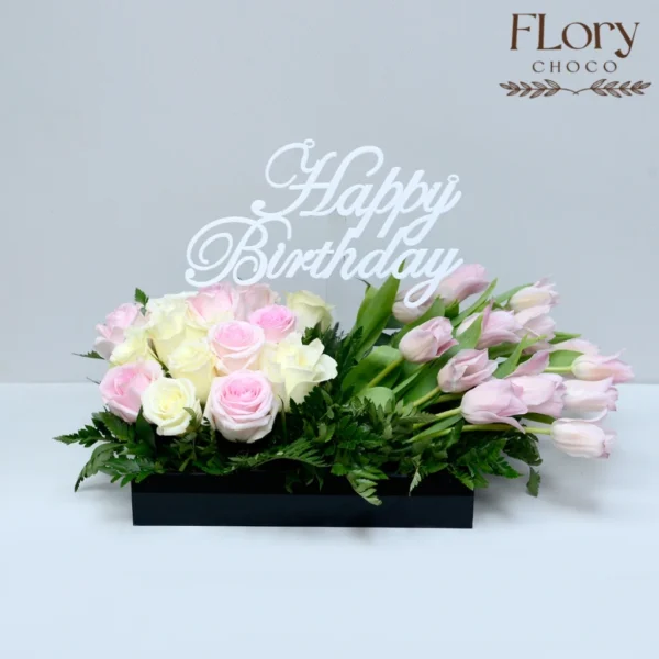 Floral Serenity birthday flower arrangement with roses, tulips and leather leaves on acrylic tray – online flower delivery in Qatar