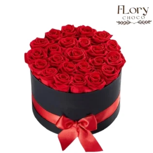 Red roses birthday box arranged in a round black hat box, elegant birthday flowers in Qatar