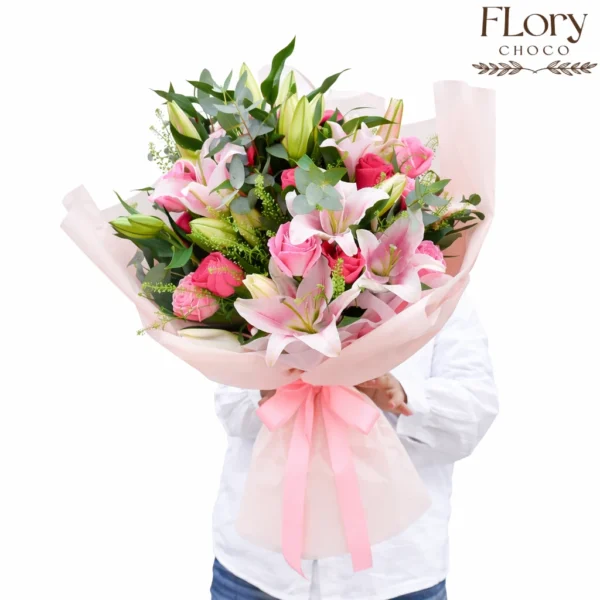 Romantic Anniversary Bloom – model holding bouquet, perfect last-minute anniversary flower delivery in Qatar
