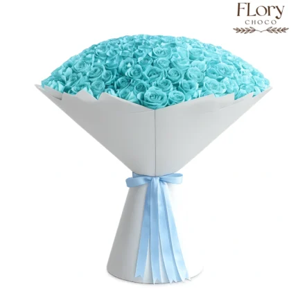 Sky Luxe premium blue roses bouquet in white wrap for unique surprises with same-day flower delivery in Qatar