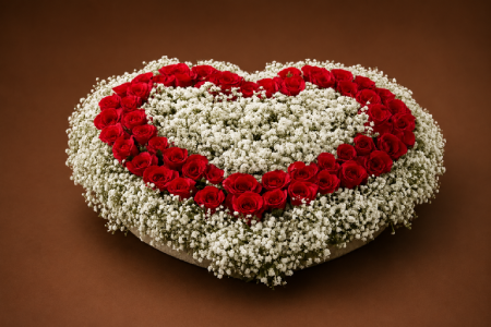 Heart-shaped flower arrangement with fresh blooms for romantic gifting and same-day flower delivery in Doha, Qatar